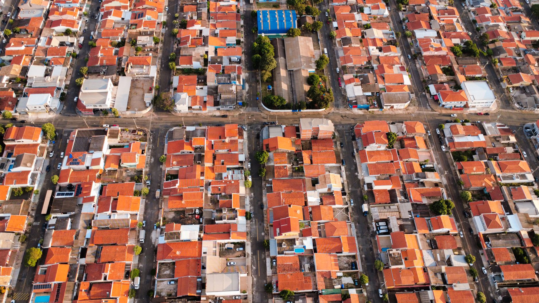 Aerial shot of urban neighborhood with red rooftops in Hortolândia, São Paulo, Brazil.