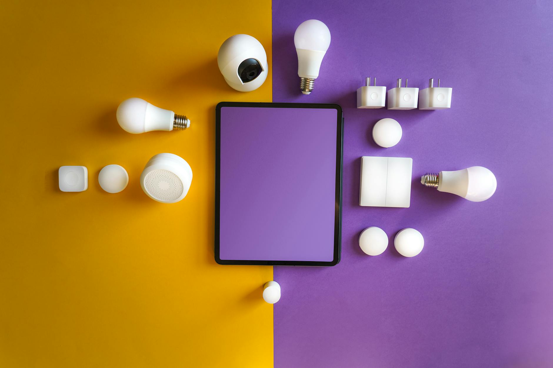 Innovative smart home gadgets arranged in a modern flat lay.